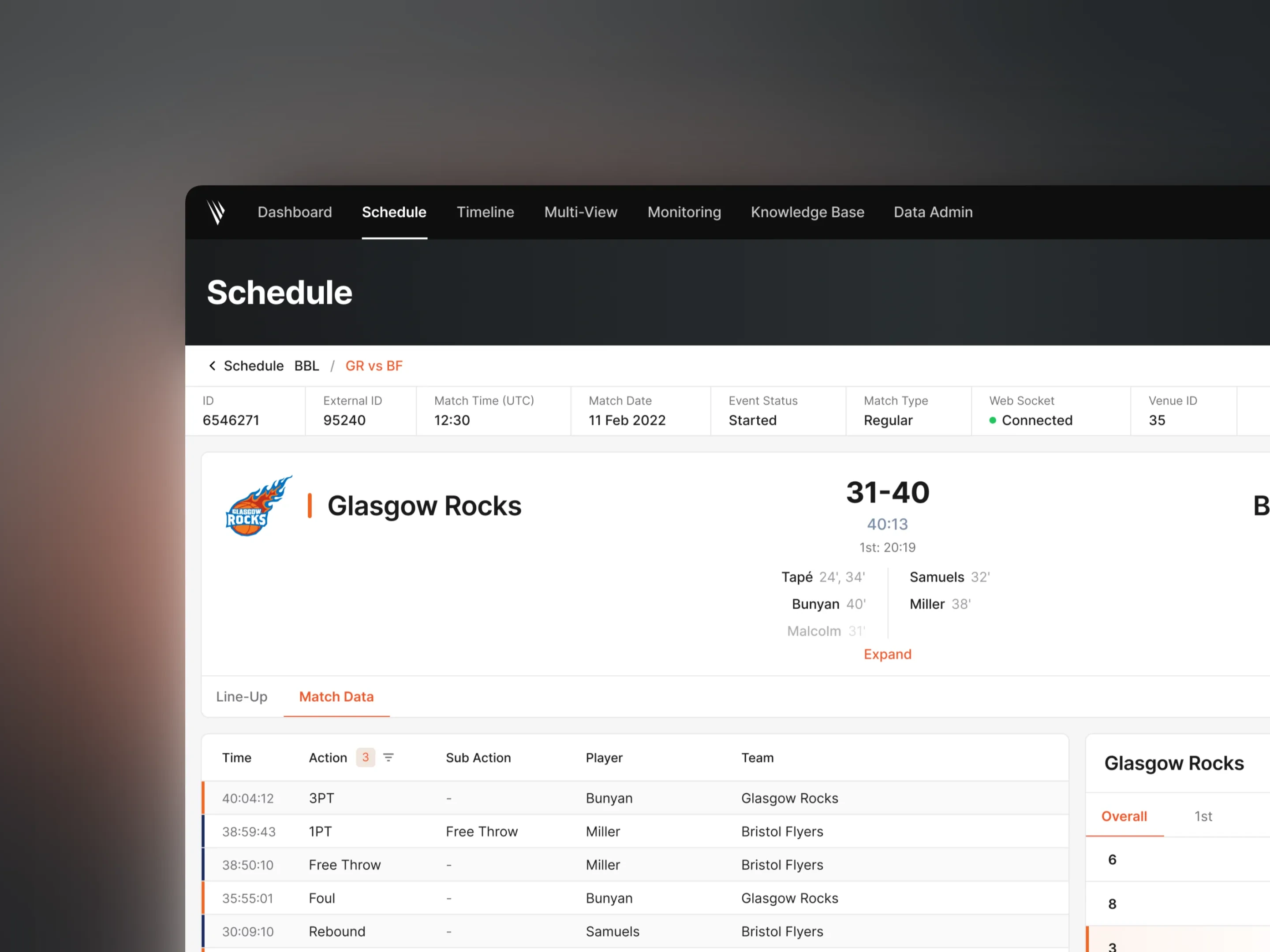 The OPS UI schedule view for a single fixture, showing match metadata above a live score and a timestamped table of match actions
